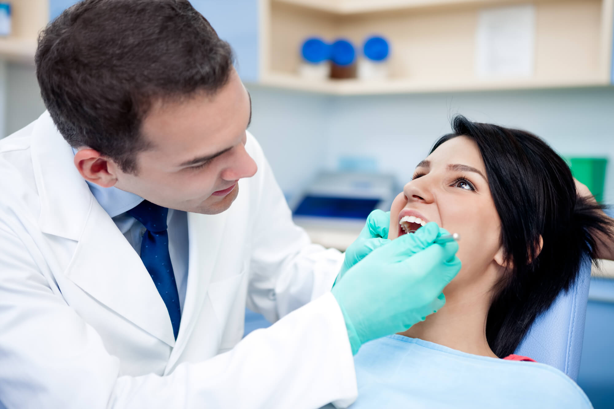 an Endodontist in Richmond VA checks a patient's infected tooth