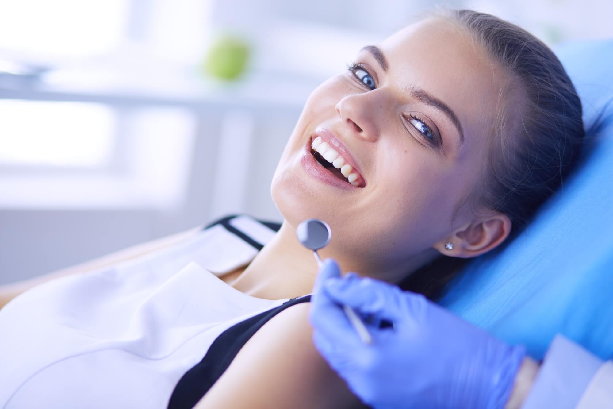 a young athlete smiling at the Endodontist in 2322