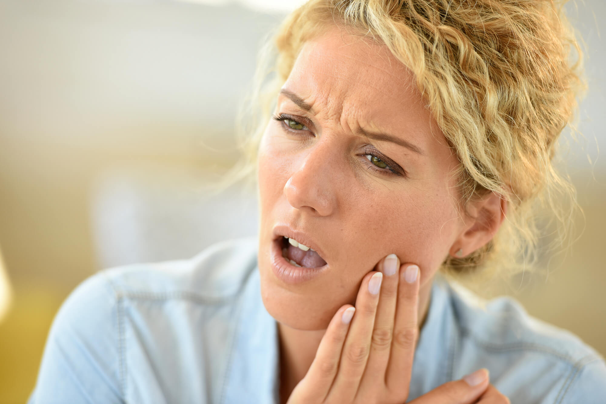 a woman needing a Root Canal in Midlothian